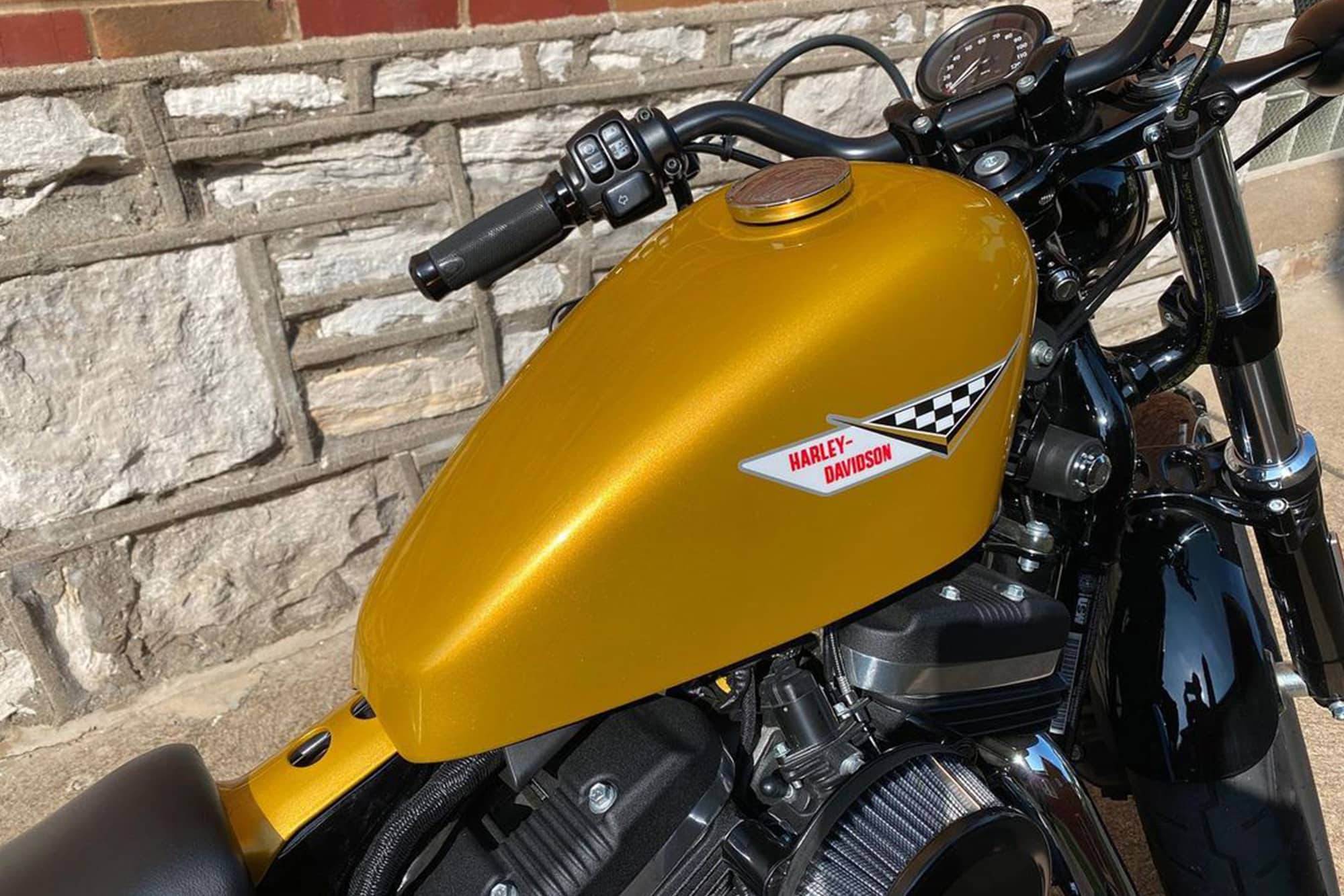 Harley Davidson Forty-Eight Custom Painted Gold Candy, closeup installed on bike