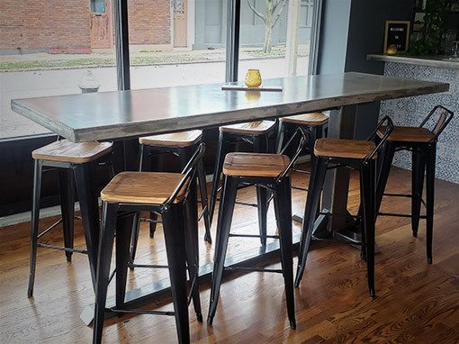 Custom Steel Cantilever Table Base – Event Venue Bar